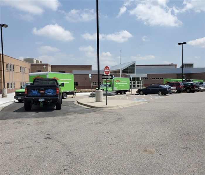 SERVPRO trucks outside of a local school to assist with water damage clean up