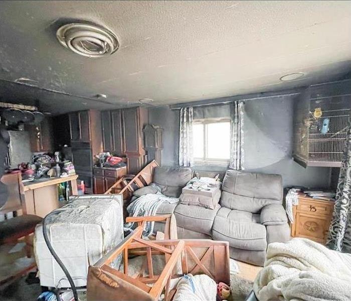 The interior of a house that has been disarranged due to fire damage.