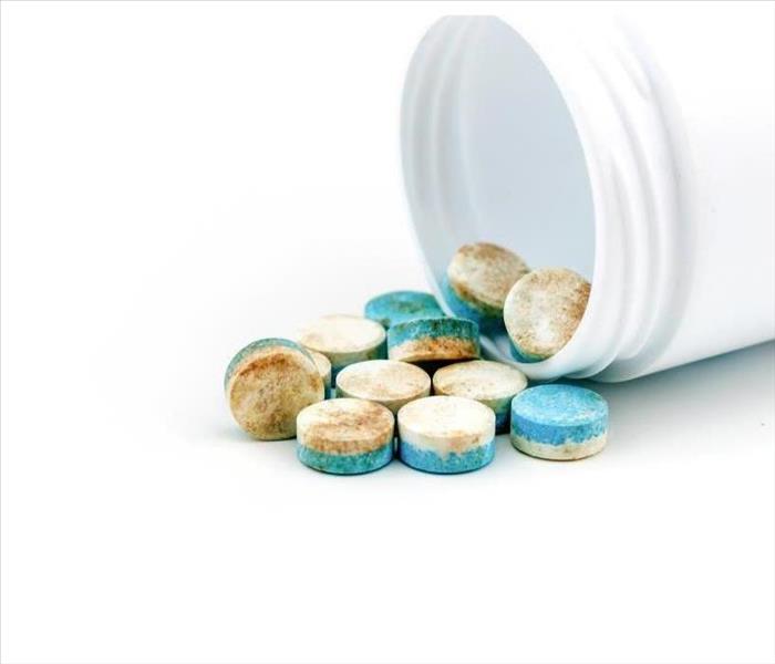 Blue & white pills medicine the drug expired.on white background 